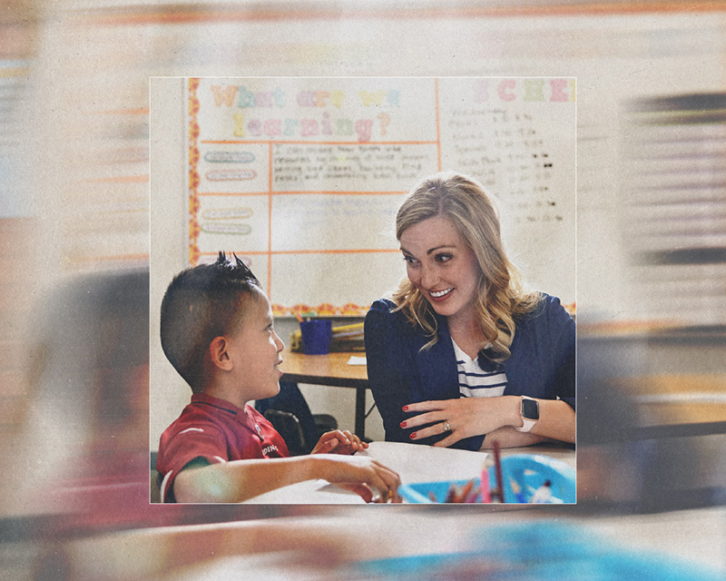 Host Lauren Keeling talks with a student in the classroom.