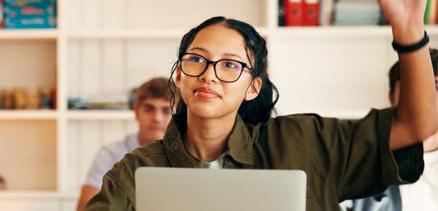 Student raising hand.